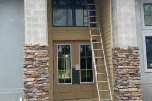 Image of entryway before stone work by Top Dog Painting and Decorative Stonework